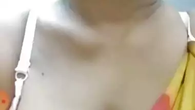 MILF aunty showing boobs out from saree and bra