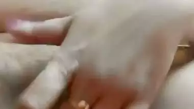 Chubby, young lady enjoys fingering her shaved pussy