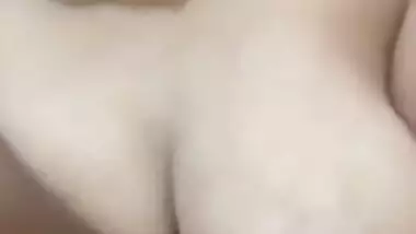 Pleasant Indian girl squeezes left breast and it also can be called porn