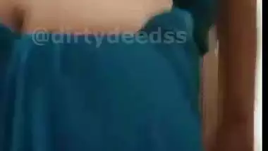 Homely housewife strips saree and shows naked boobs