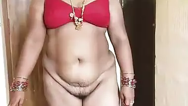 Tamil milf strips and gets naked before her Nephew
