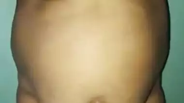 Fat Indian woman motivates hubby to have sex by showing giant XXX tits