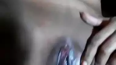Chubby Indian girl fingering her wet pussy