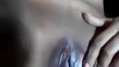 XXX porn lover fingers her own pussy in the homemade Desi clip MMS