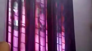 Tempting teen Desi lies down on her back to rub XXX body for sex show