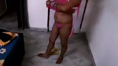 Fascinating Desi with succulent XXX twins performs dressing show for Bhabhi porn