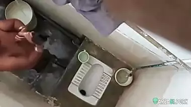 XXX clip of village aunty taking bath in outdoor taken on her son