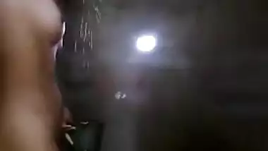 Slinky sex Indian woman takes her clothes off and flashes her XXX tits