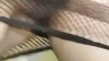 Hot Desi babe in fishnet dress has her pussy XXX rubbed by lover