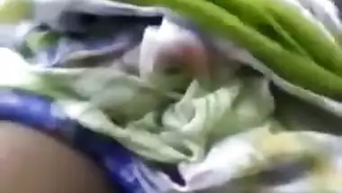 Indian diva in a colorful sari exposes touchable natural XXX boobs