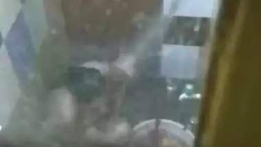 Perv is going to jerk off to porn video of Desi neighbor taking a shower