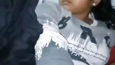 Young village girl taking carrot