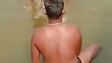 XXX video of Desi girl who flirts with a bunch of guys in a river